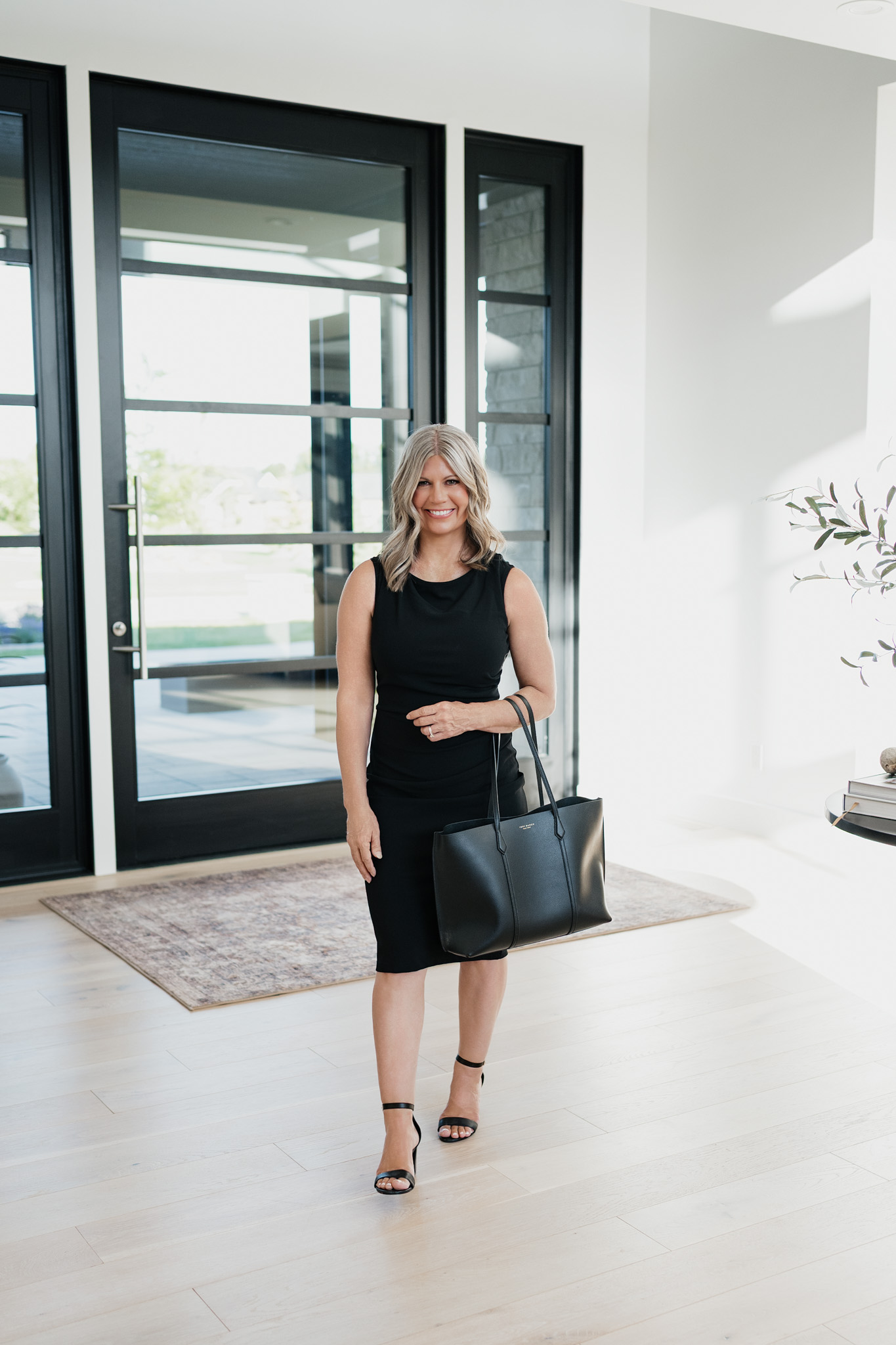 Tracie McDonald inside a modern home