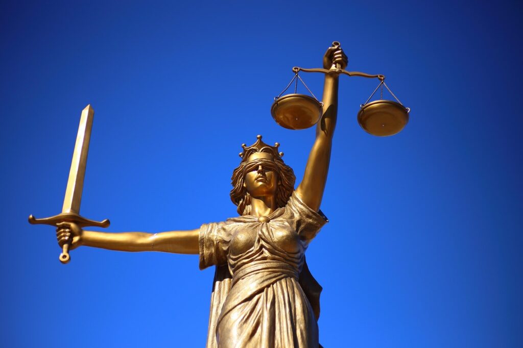 A statue of Lady Justice, representing Themis from Greek mythology, associated with law and courts.