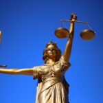 A statue of Lady Justice, representing Themis from Greek mythology, associated with law and courts.