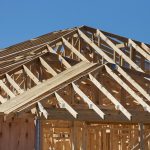 New construction home under construction with wood framing